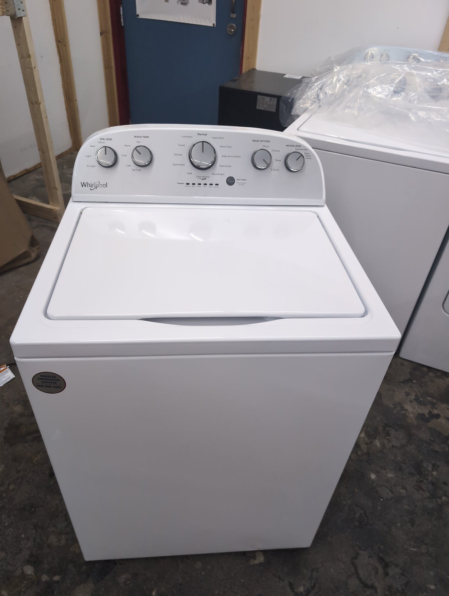 Used Whirlpool 3.5 cubic foot top load washer with agitator and 7 cubic foot electric dryer set.