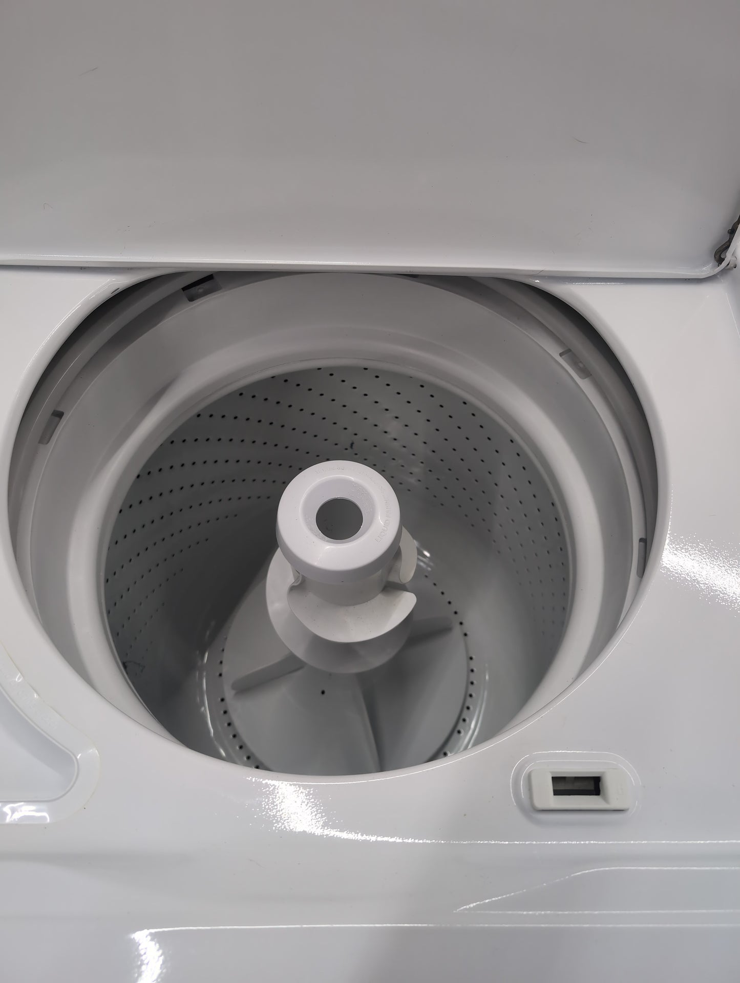 Used Whirlpool 3.5 cubic foot top load washer with agitator and 7 cubic foot electric dryer set.