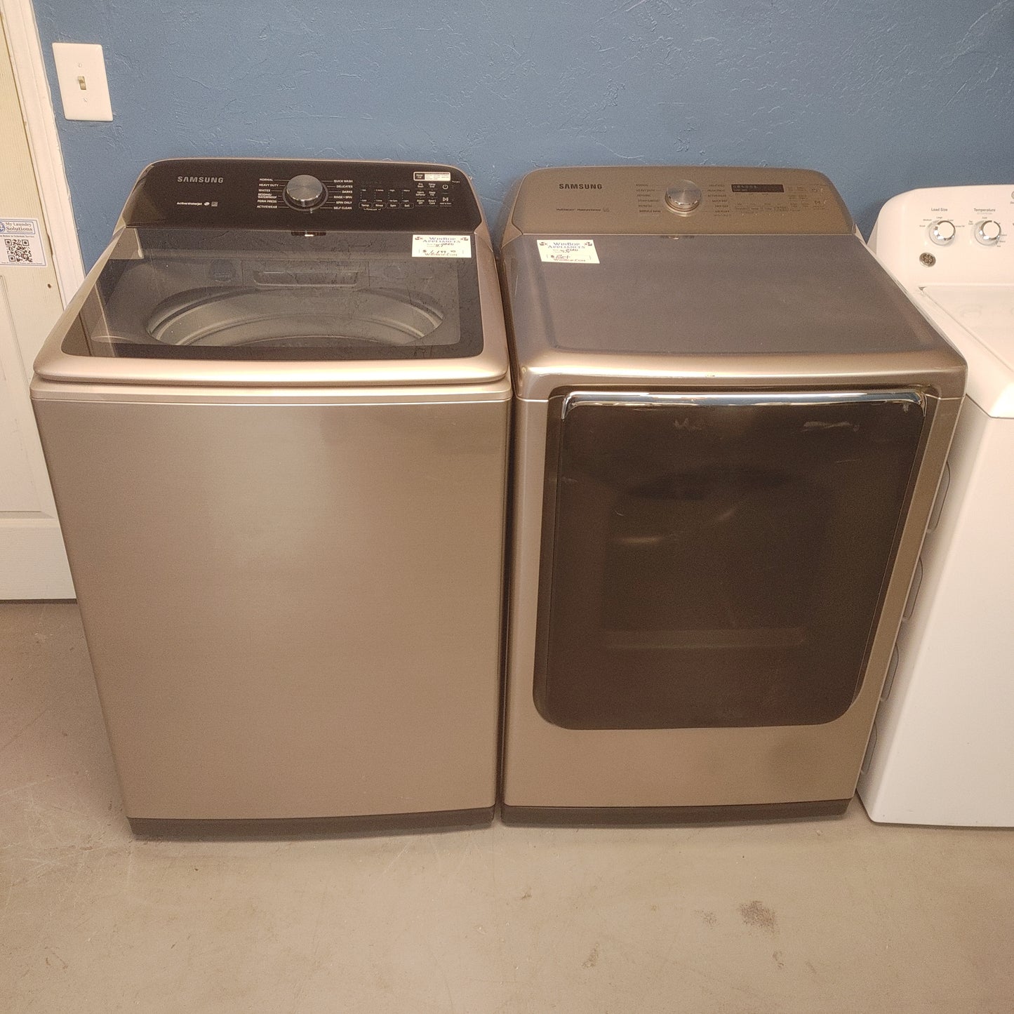 Used Samsung Rose Gold 5.1 cubic ft Top load Washer and 7.4 cubic ft Electric Steam Dryer set