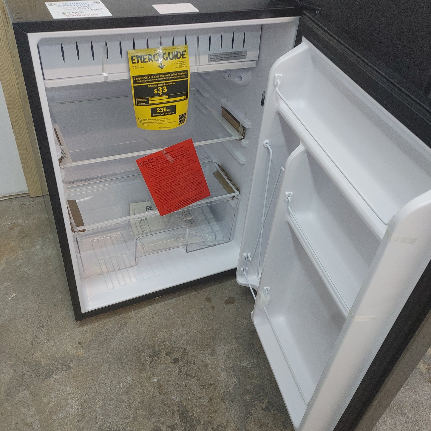 New GE 5.6 cubic ft Small Refrigerator with freezer compartment