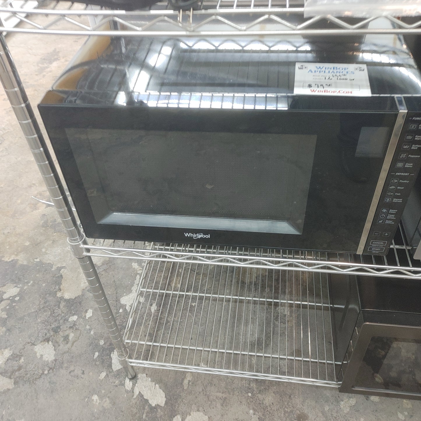 Used Whirlpool 1.6 cubic foot 1,000 W countertop microwave