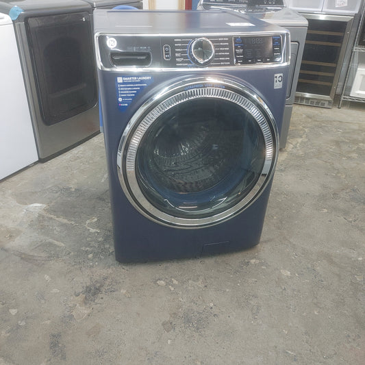 Used GE 5 ft front load washer with power Steam quiet control Smart Control and one step wash + dry