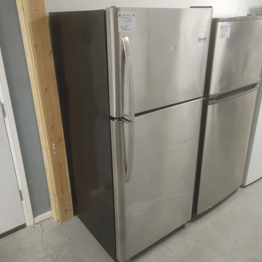 Used Frigidaire 20.4 cubic foot top freezer refrigerator. Stainless