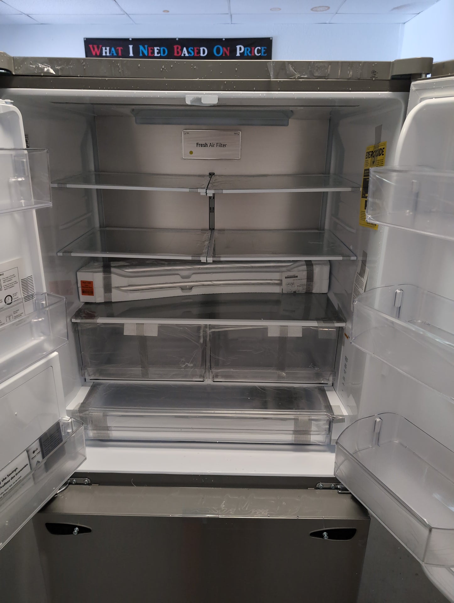 New LG counter depth 26 cubic foot stainless steel French door refrigerator with ice and water in the door. Door Damage