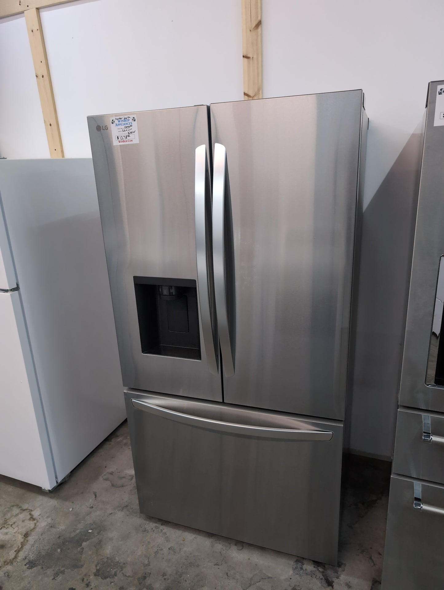 New LG 26 cubic foot French door refrigerator, stainless steel