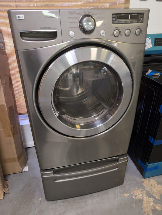 Used LG 7.5 cubic foot. True steam electric dryer with pedestal
