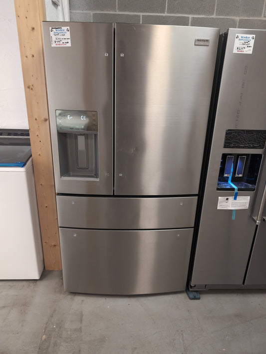 Used Frigidaire Gallery 22 cubic foot counter depth stainless steel four-door refrigerator with ice and water in the door